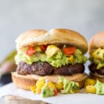 An avocado burger with avocado mash and pineapple relish.