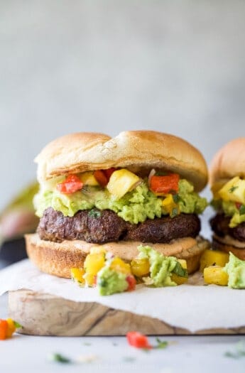 An avocado burger with avocado mash and pineapple relish.