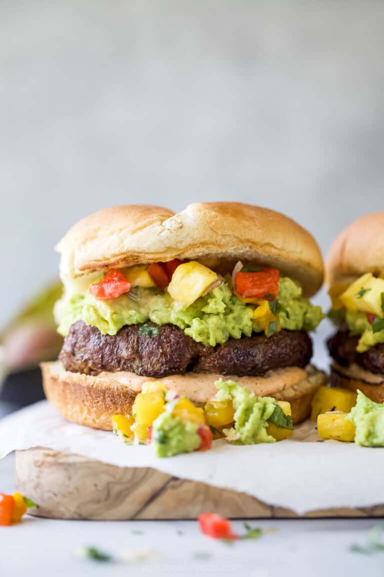 An avocado burger with avocado mash and pineapple relish.