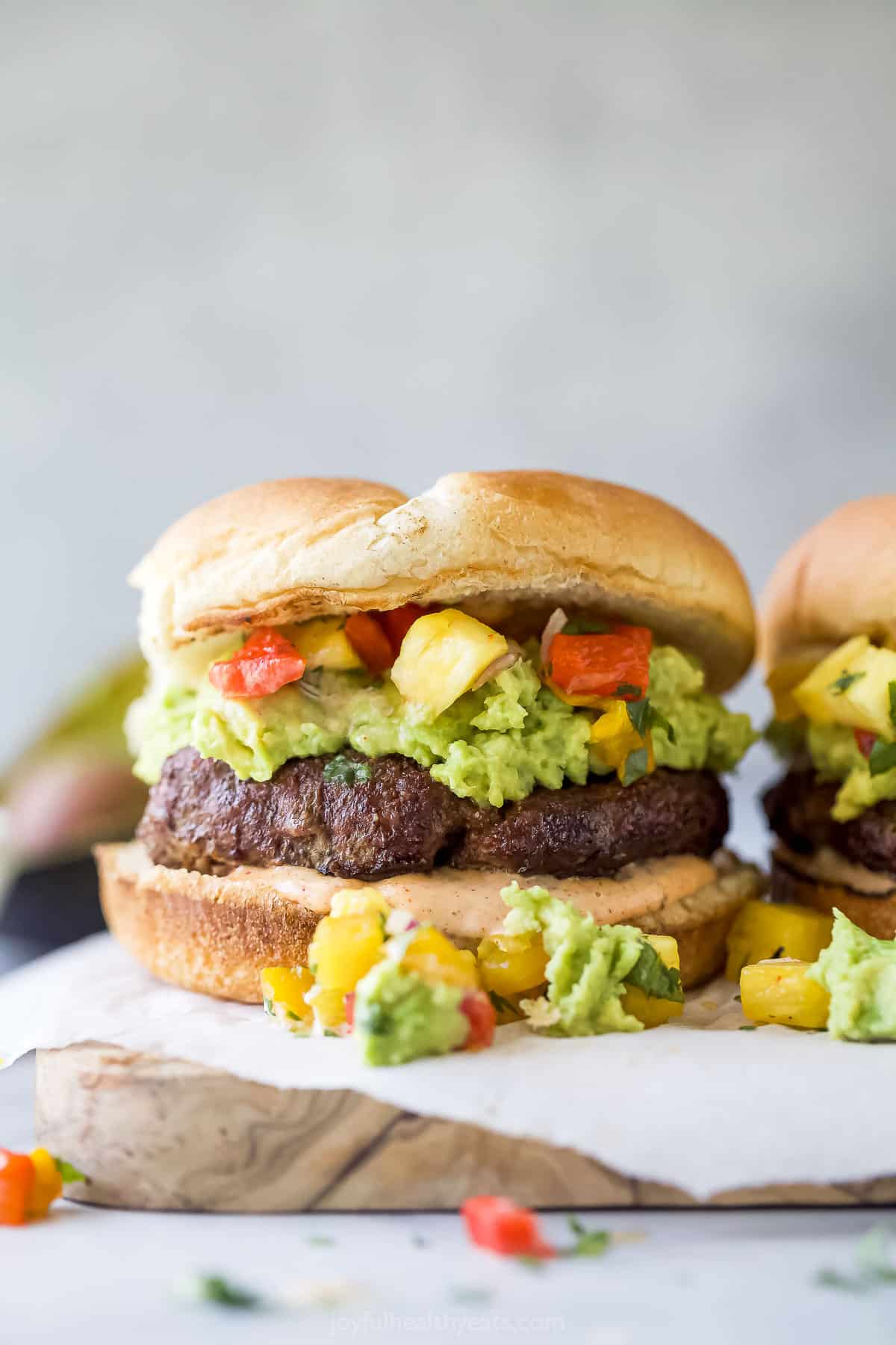 An avocado burger with avocado mash and pineapple relish. 