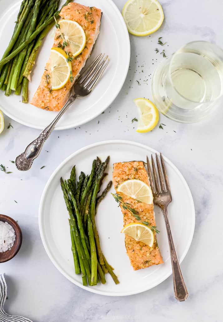 baked salmon on a plate with asparagus