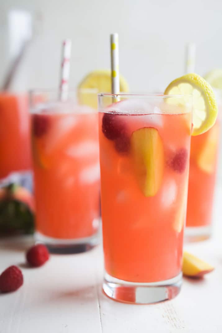 A Homemade Raspberry Peach Lemonade Recipe made with fresh raspberries and peaches for the ultimate refreshing drink to cool you down this summer! | joyfulhealthyeats.com