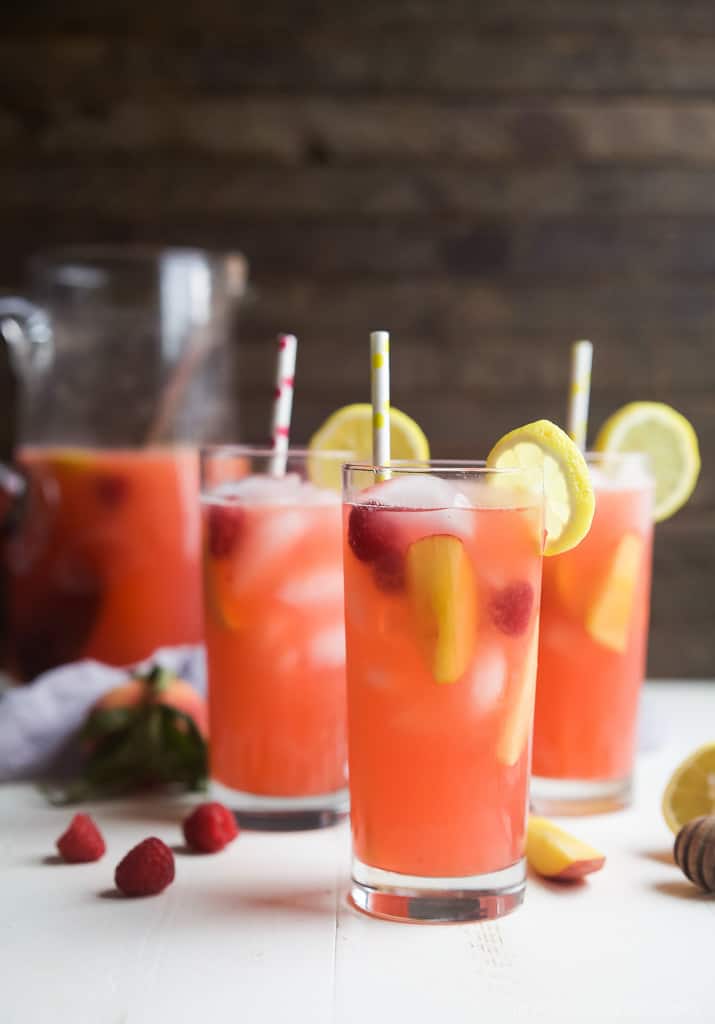 A Homemade Raspberry Peach Lemonade Recipe made with fresh raspberries and peaches for the ultimate refreshing drink to cool you down this summer! | joyfulhealthyeats.com 