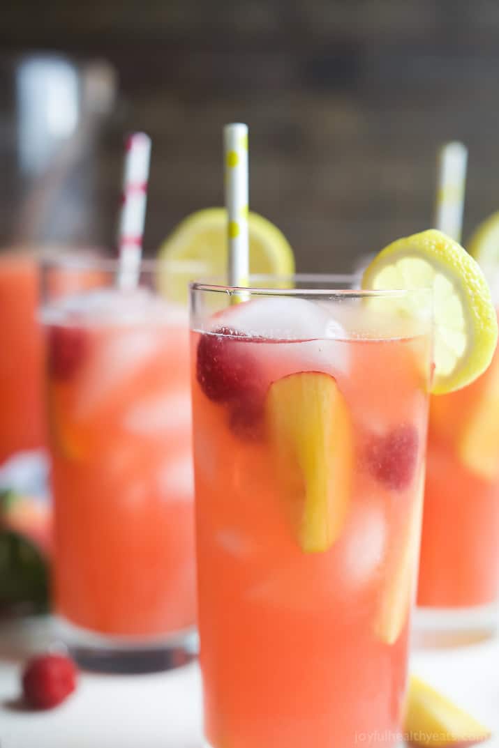 A Homemade Raspberry Peach Lemonade Recipe made with fresh raspberries and peaches for the ultimate refreshing drink to cool you down this summer! | joyfulhealthyeats.com 