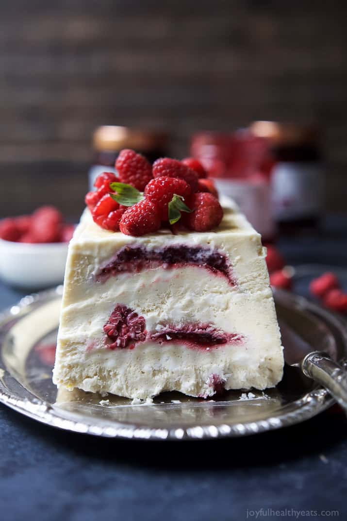 Indulgent Raspberry Amaretto Semifreddo, it's everything ice cream wishes it could be - light, creamy, and airy. This dessert is perfect for the summer and you'll love the secret sauce nestled inside every bite!| joyfulhealthyeats.com #glutenfree #ad #dairyfree