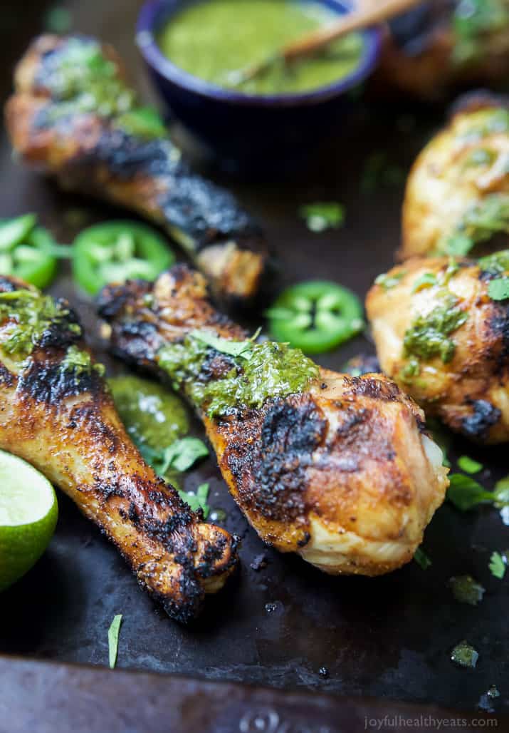 Spice Rub Grilled Chicken with a fresh Chimichurri sauce - a healthy, easy, 30 minute meal packed with fresh zesty flavors. This chicken recipe will quickly be a family favorite! | joyfulhealthyeats.com #paleo #glutenfree