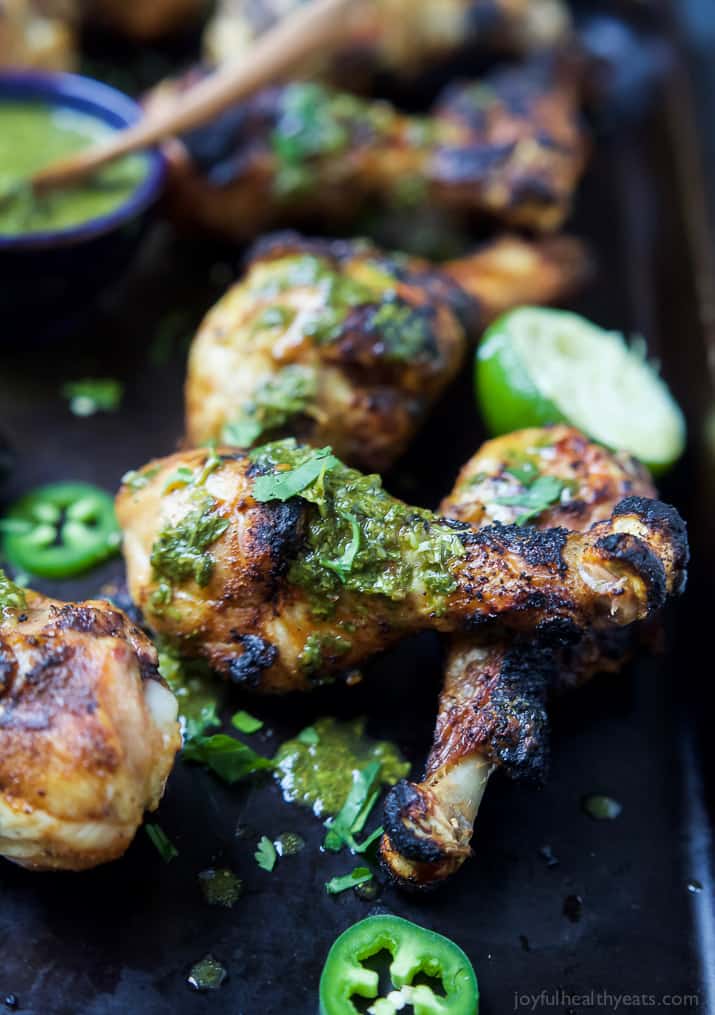 Spice Rub Grilled Chicken with a fresh Chimichurri sauce - a healthy, easy, 30 minute meal packed with fresh zesty flavors. This chicken recipe will quickly be a family favorite! | joyfulhealthyeats.com #paleo #glutenfree