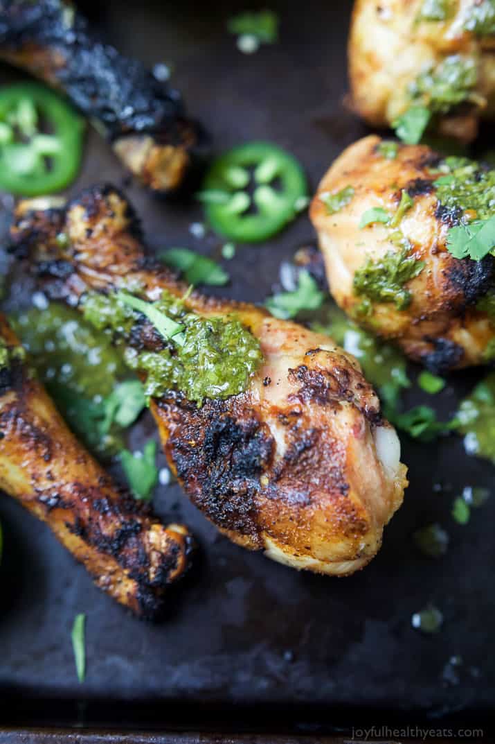 Spice Rub Grilled Chicken with a fresh Chimichurri sauce - a healthy, easy, 30 minute meal packed with fresh zesty flavors. This chicken recipe will quickly be a family favorite! | joyfulhealthyeats.com #paleo #glutenfree