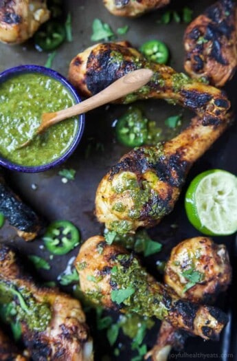 Spice Rub Grilled Chicken with a fresh Chimichurri sauce - a healthy, easy, 30 minute meal packed with fresh zesty flavors. This chicken recipe will quickly be a family favorite! | joyfulhealthyeats.com #paleo #glutenfree