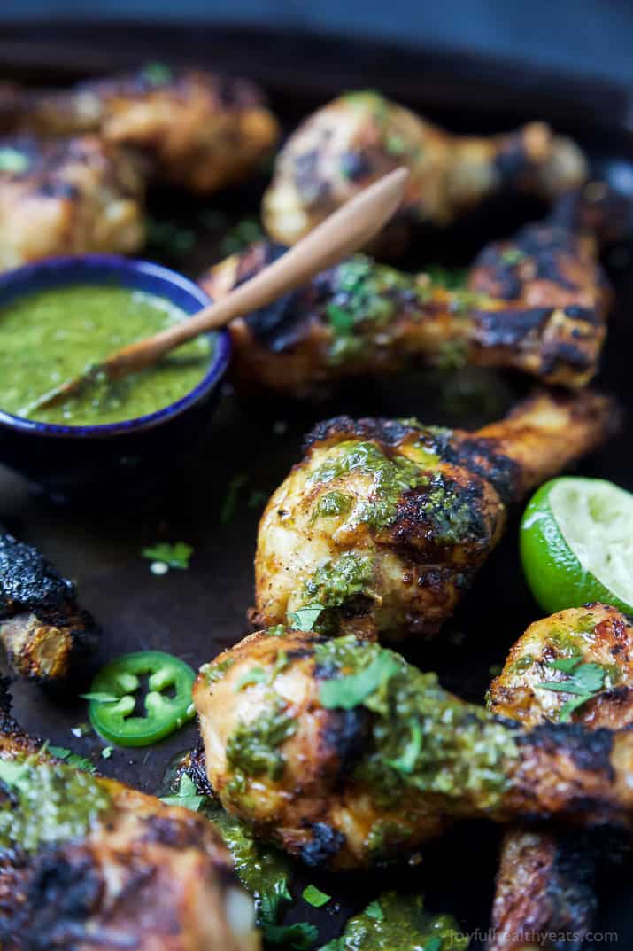 Spice Rub Grilled Chicken with a fresh Chimichurri sauce - a healthy, easy, 30 minute meal packed with fresh zesty flavors. This chicken recipe will quickly be a family favorite! | joyfulhealthyeats.com #paleo #glutenfree