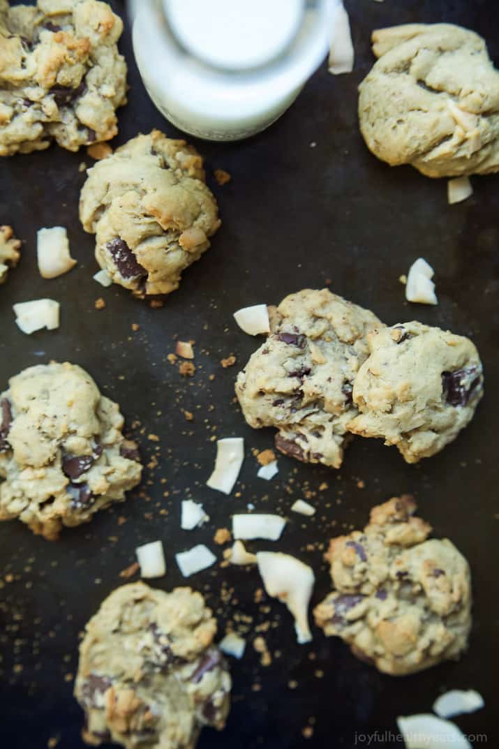 Toasted Coconut Chocolate Chunk Cookies that are soft, chewy, oozing with chocolate goodness all while using LESS butter and sugar! I guarantee you'll want to hoard these cookies! | joyfulhealthyeats.com