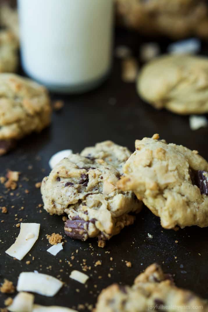 Toasted Coconut Chocolate Chunk Cookies that are soft, chewy, oozing with chocolate goodness all while using LESS butter and sugar! I guarantee you'll want to hoard these cookies! | joyfulhealthyeats.com 