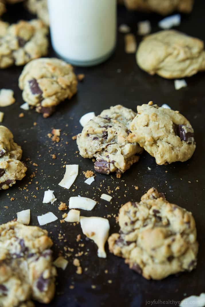 Toasted Coconut Chocolate Chunk Cookies that are soft, chewy, oozing with chocolate goodness all while using LESS butter and sugar! I guarantee you'll want to hoard these cookies! | joyfulhealthyeats.com 