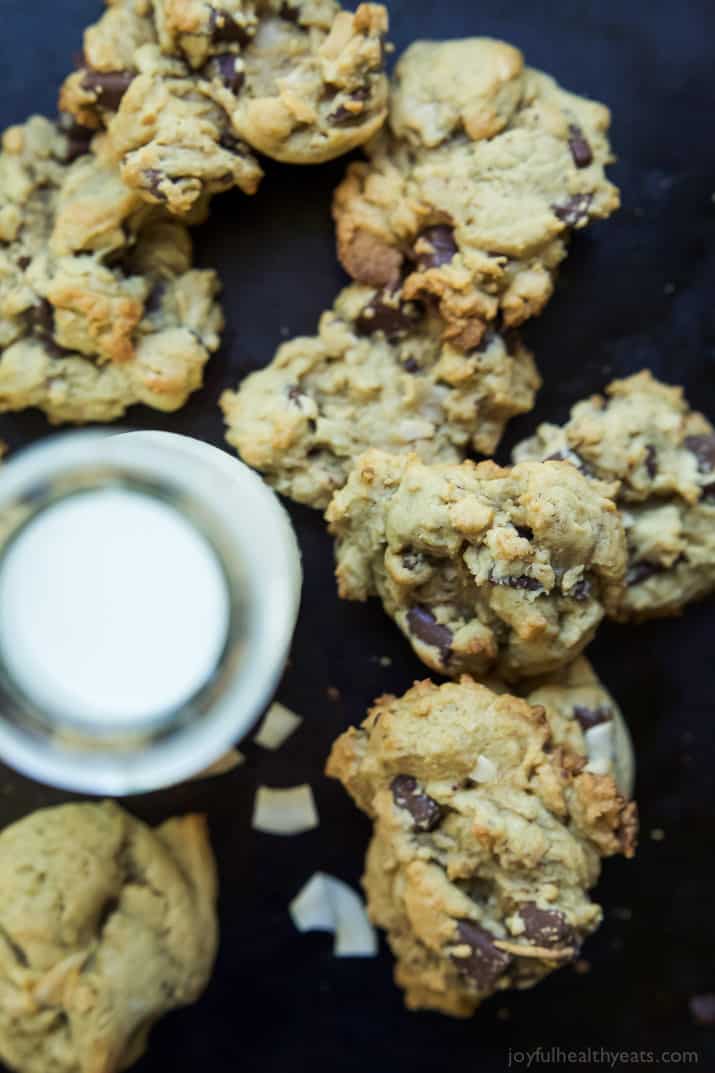 Toasted Coconut Chocolate Chunk Cookies that are soft, chewy, oozing with chocolate goodness all while using LESS butter and sugar! I guarantee you'll want to hoard these cookies! | joyfulhealthyeats.com 