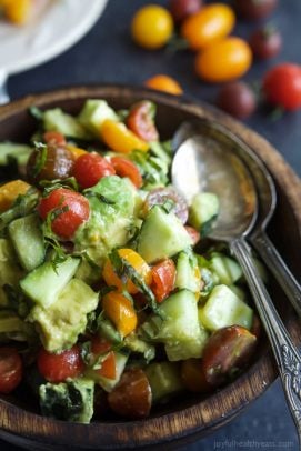 This summer Tomato Avocado Cucumber Salad is pure perfection - light, refreshing, 5 minutes to make, minimal ingredients, low on calories and booming with flavor! | joyfulhealthyeats.com #paleo #glutenfree