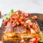 Grilled salmon with strawberry salsa.