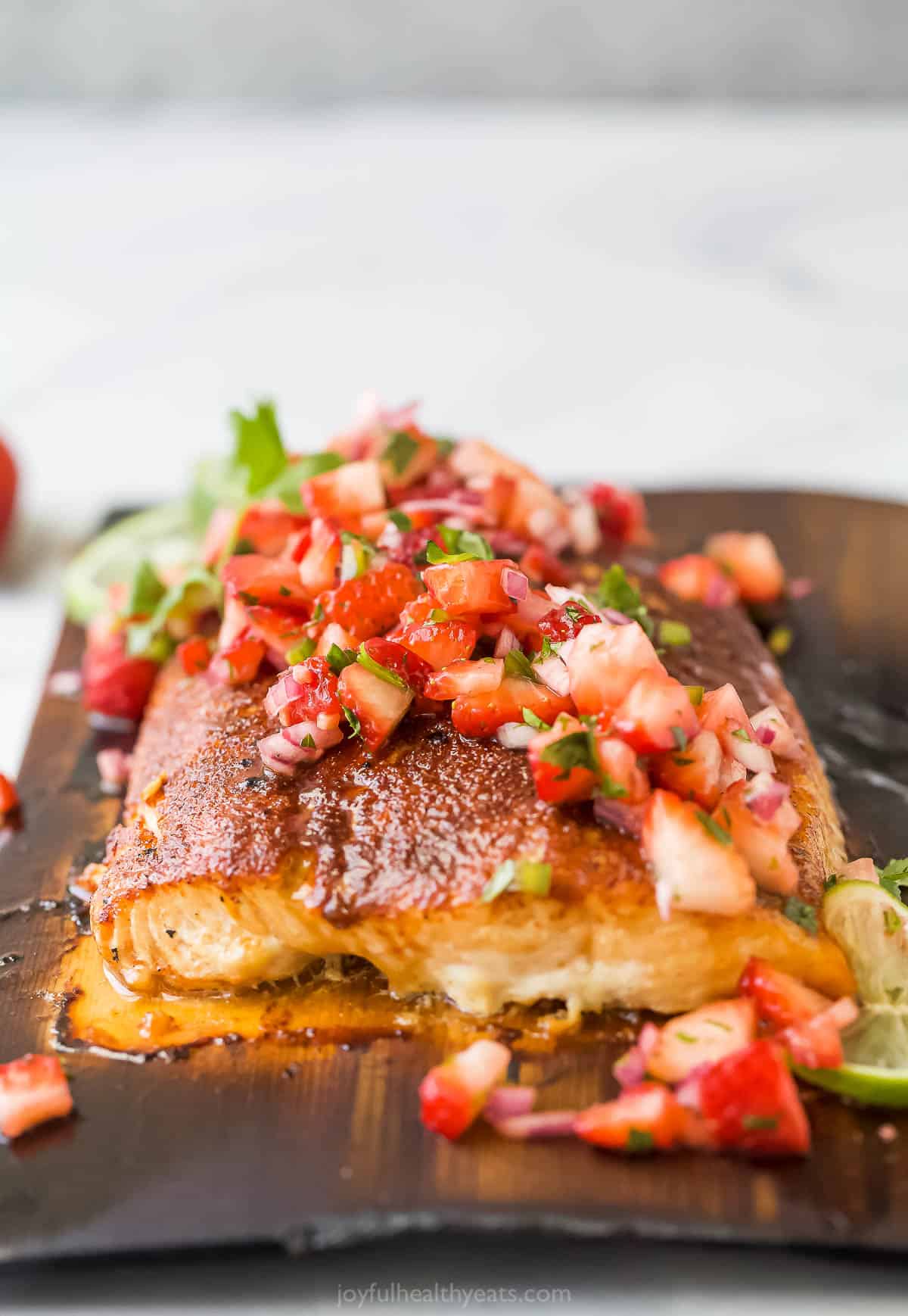 Grilled salmon with strawberry salsa. 