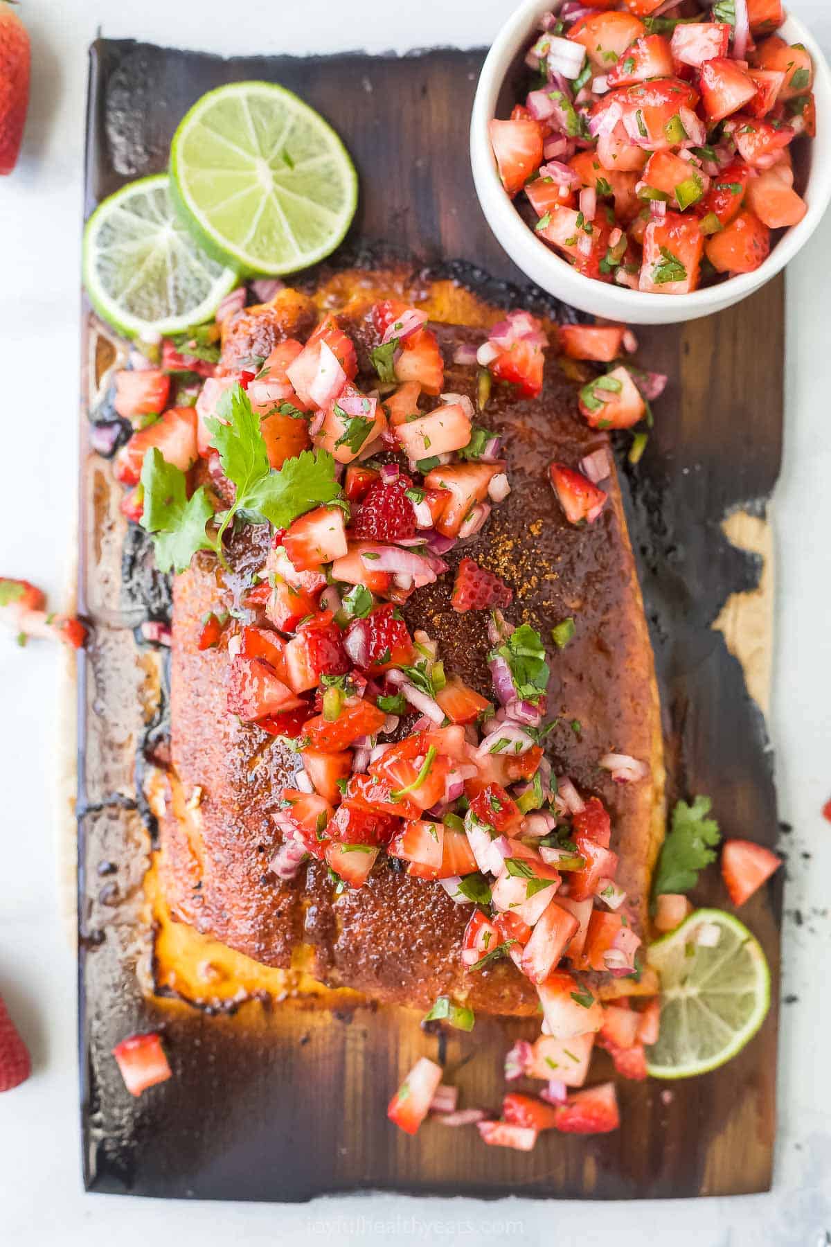 Cedar plank salmon with strawberry salsa. 