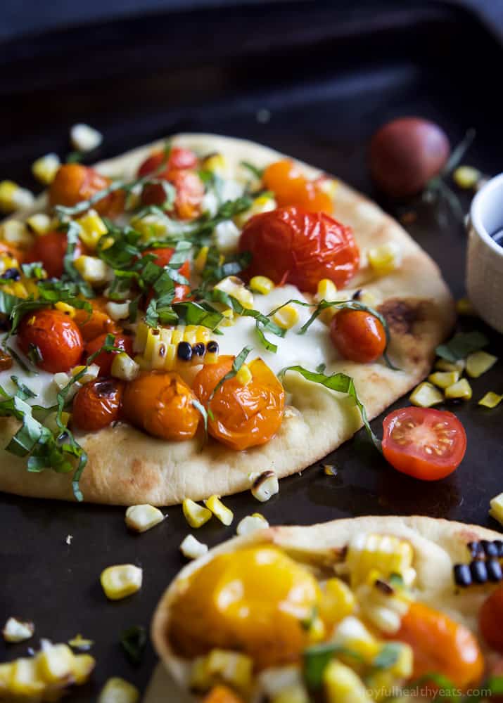 Close-up view of Charred Corn Caprese Flatbread