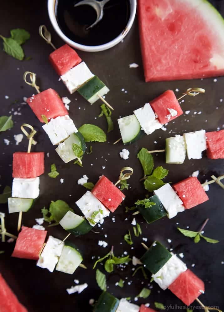 Watermelon Feta Bruschetta, the easiest appetizer recipe you'll ever make! Watermelon, Cucumber, and Feta Cheese all skewered together and topped with a sweet Balsamic Reduction that'll blow your mind. A must this summer! | joyfulhealthyeats.com #glutenfree