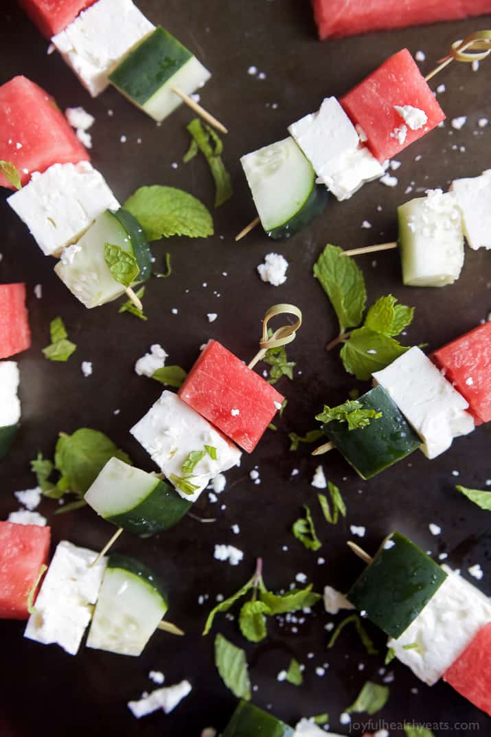 Watermelon Feta Bruschetta, the easiest appetizer recipe you'll ever make! Watermelon, Cucumber, and Feta Cheese all skewered together and topped with a sweet Balsamic Reduction that'll blow your mind. A must this summer! | joyfulhealthyeats.com #glutenfree