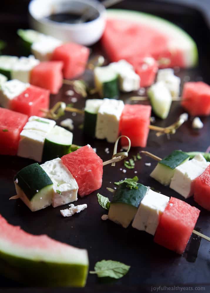 Watermelon Feta Bruschetta, the easiest appetizer recipe you'll ever make! Watermelon, Cucumber, and Feta Cheese all skewered together and topped with a sweet Balsamic Reduction that'll blow your mind. A must this summer! | joyfulhealthyeats.com #glutenfree