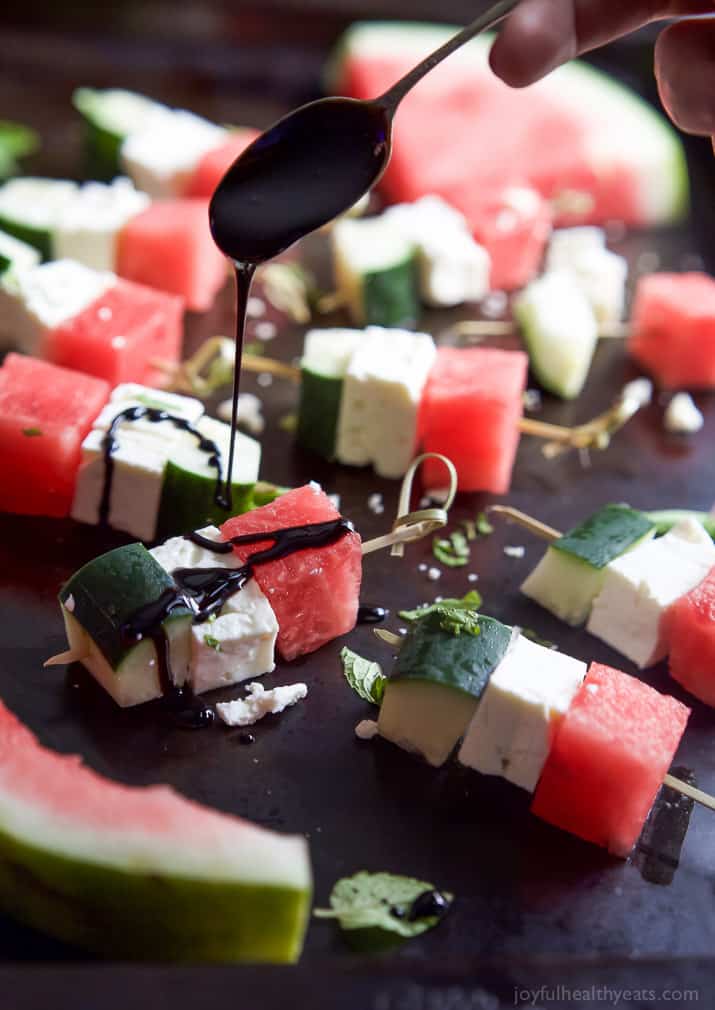 Watermelon Feta Bruschetta, the easiest appetizer recipe you'll ever make! Watermelon, Cucumber, and Feta Cheese all skewered together and topped with a sweet Balsamic Reduction that'll blow your mind. A must this summer! | joyfulhealthyeats.com #glutenfree