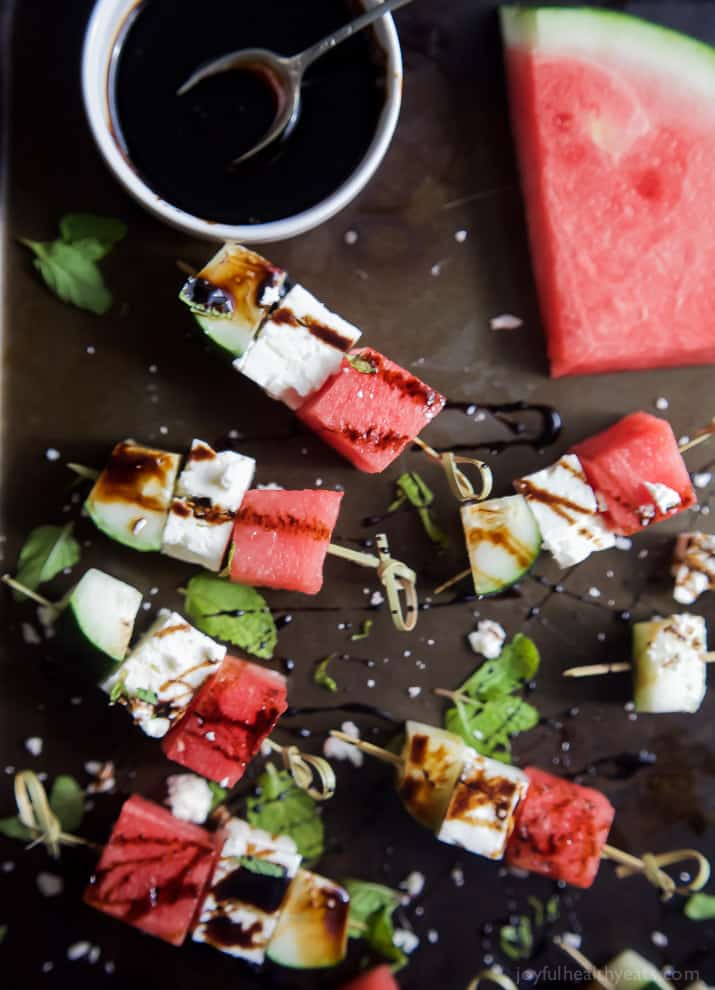 Watermelon Feta Bruschetta, the easiest appetizer recipe you'll ever make! Watermelon, Cucumber, and Feta Cheese all skewered together and topped with a sweet Balsamic Reduction that'll blow your mind. A must this summer! | joyfulhealthyeats.com #glutenfree