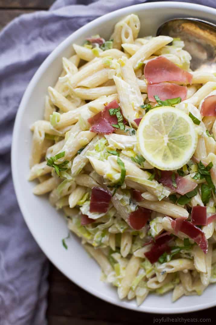 Top view of a bowl of Creamy Lemon Pasta with Prosciutto