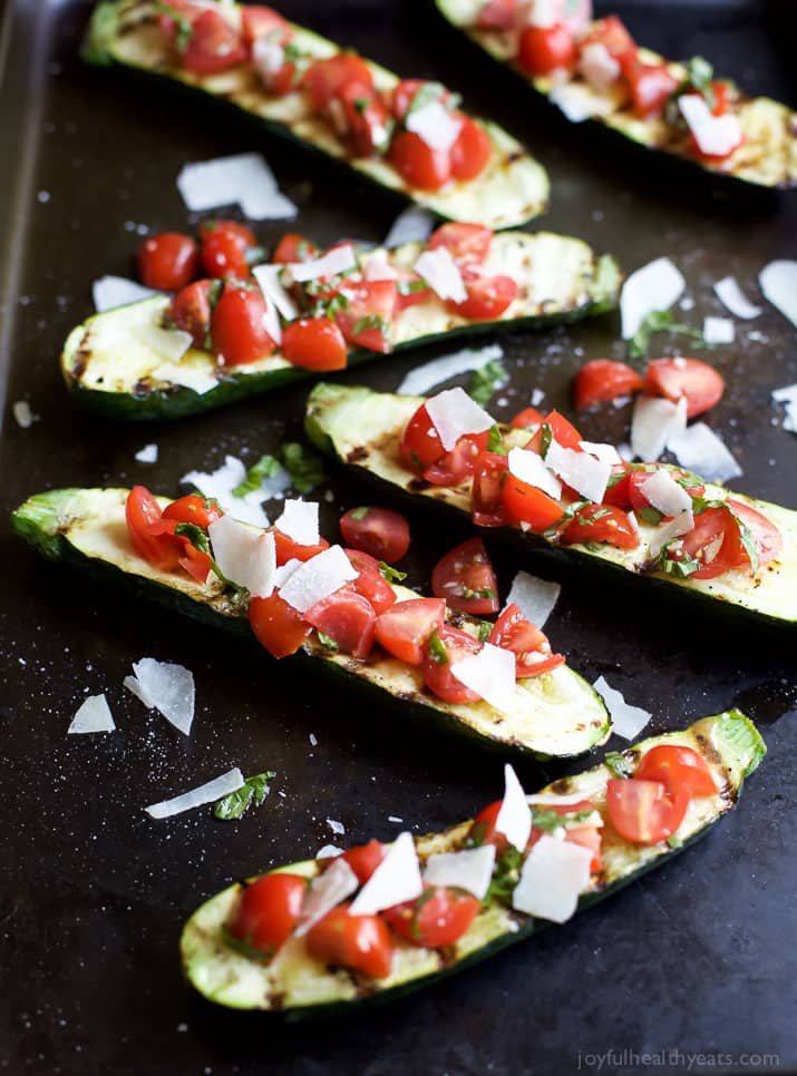 Grilled Zucchini topped with fresh Tomato Basil Bruschetta and Parmesan