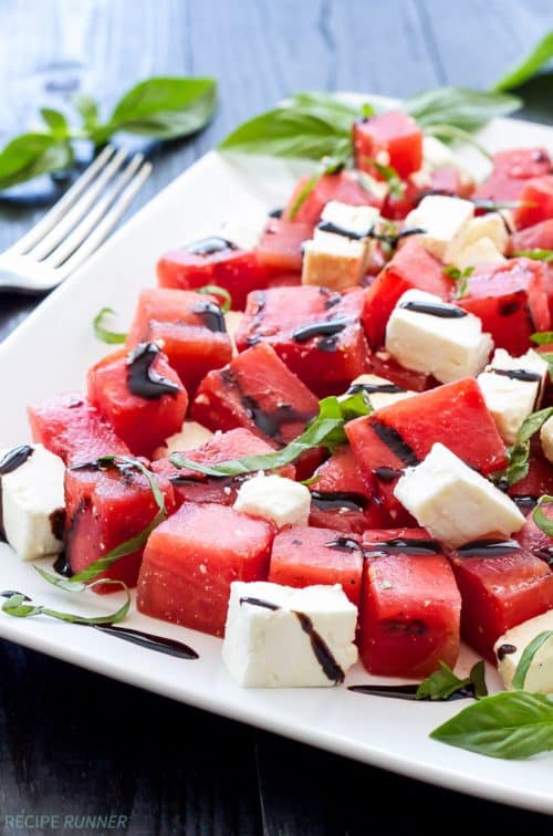 Sweet juicy watermelon salad paired with salty feta, fresh basil, and tart lime juice is a refreshing and easy to make summer salad.