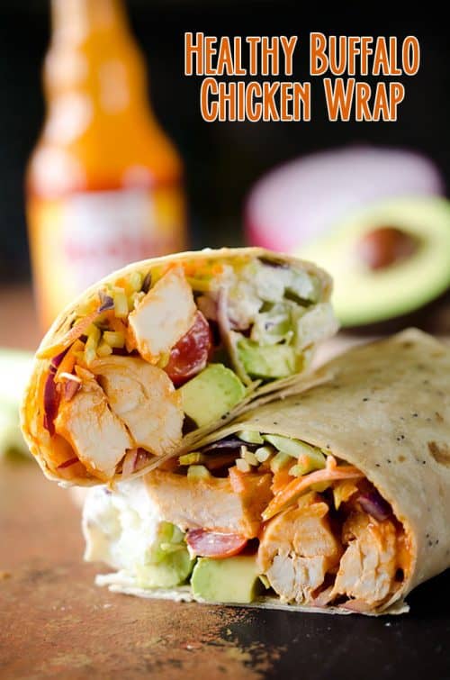 Healthy Buffalo Chicken Wrap is a light and healthy wrap filled with buffalo chicken breasts, Greek yogurt, bleu cheese crumbles, broccoli slaw, celery, avocado and tomatoes for an easy lunch with bold flavor!