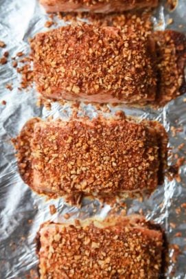 Honey Mustard Pecan Crusted Salmon on a baking sheet