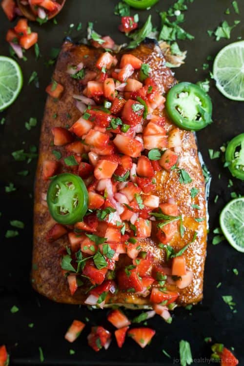 The Close-up View of a Spice-Rubbed Cedar Plank Salmon with Strawberry Salsa