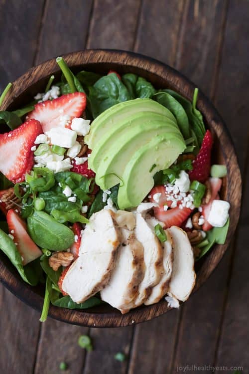 A Bowl Filled with a Strawberry Avocado Chicken Salad with Balsamic Vinaigrette