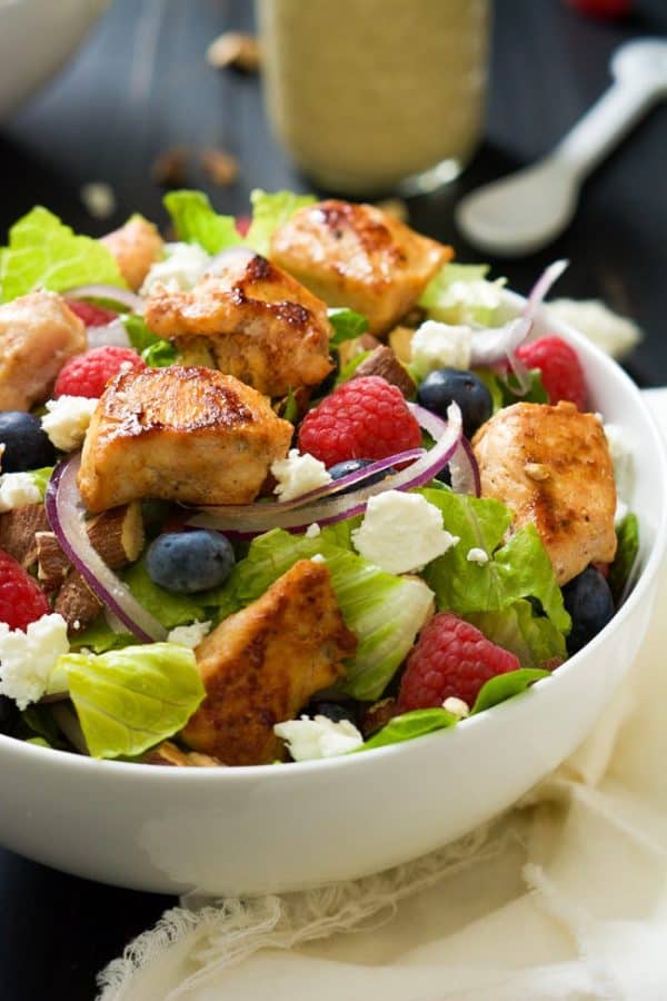 A hearty Chicken Salad with Peanut Dijon Dressing that is filled with fruit, creamy goat cheese, smoked almonds that is a nutritious dinner or lunch!