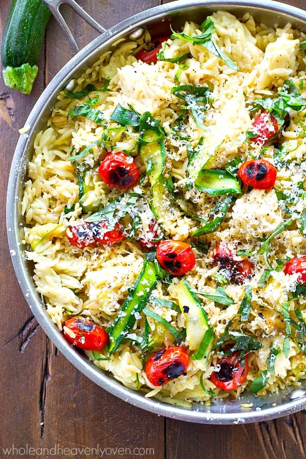 This healthy veggie-loaded orzo skillet is a veggie-lover’s dream! Ready in less than 30 minutes and perfect for a quick summer weekday dinner or lunch!