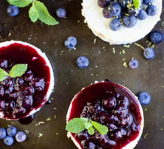 A few mini Goat Cheese Cheesecakes with Blueberry Compote topping.