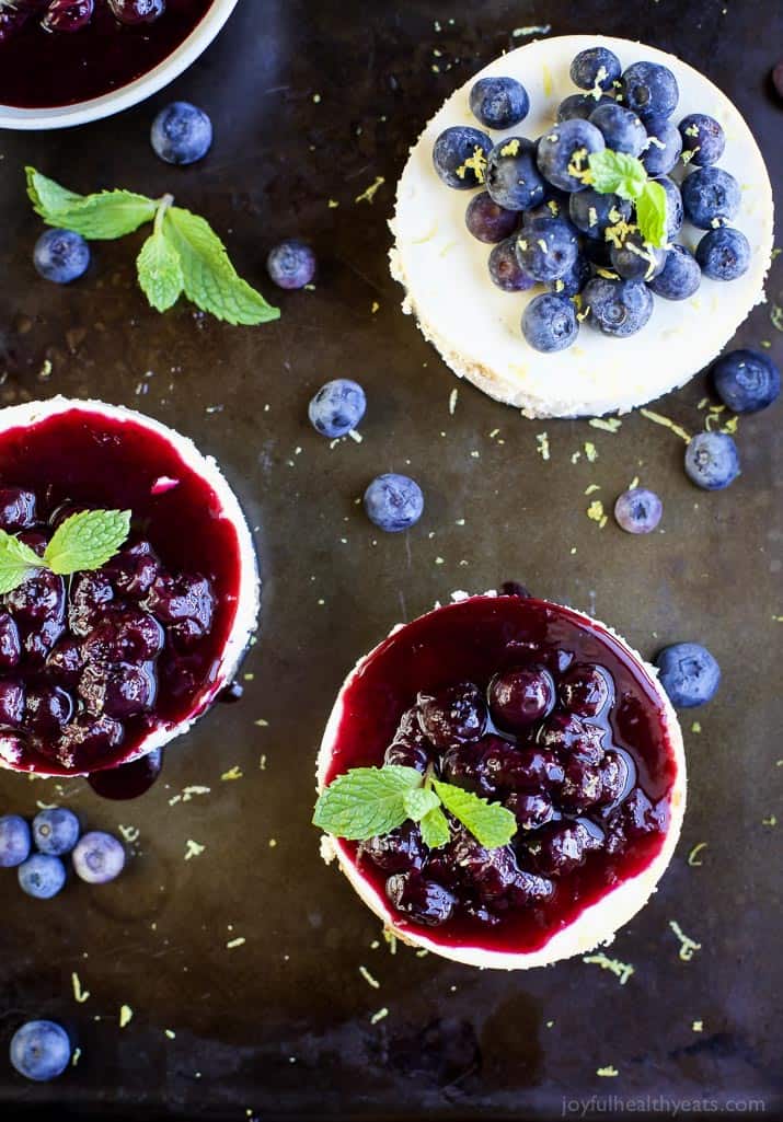 Top view of Mini Goat Cheese Cheesecakes topped with blueberries