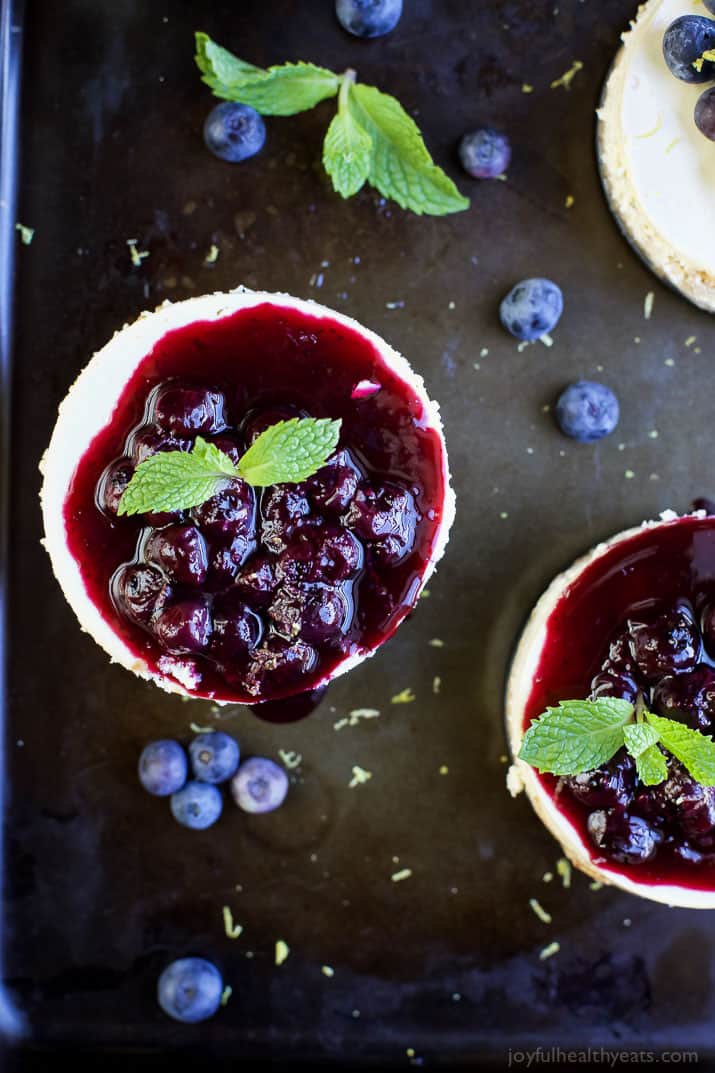 Top view of Mini Goat Cheese Cheesecakes topped with blueberries