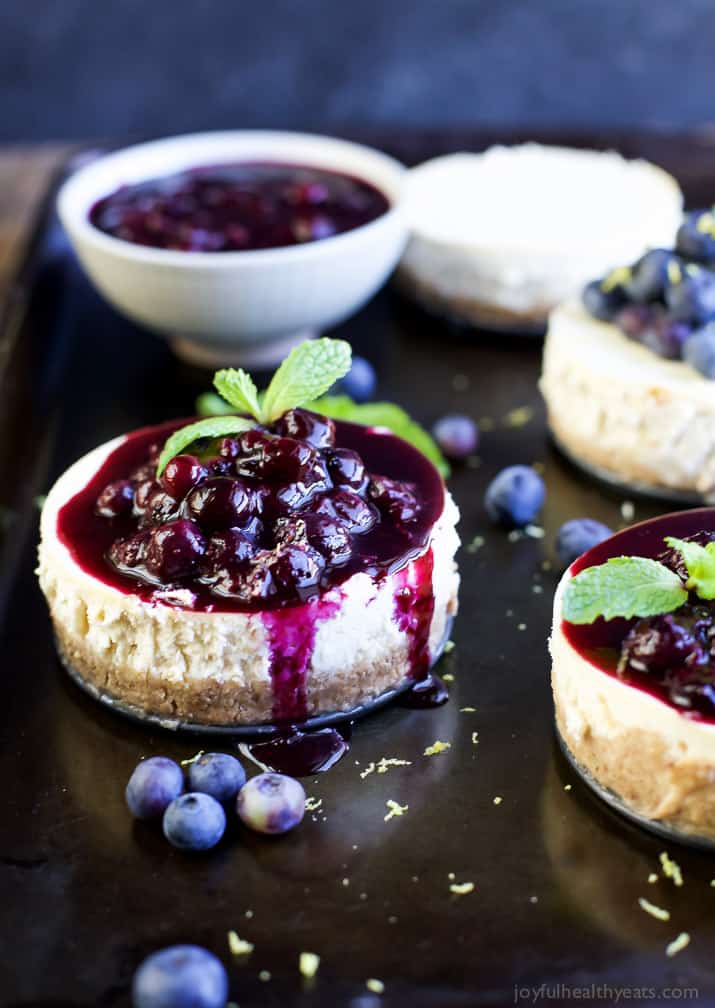 Mini Goat Cheese Cheesecakes topped with blueberries