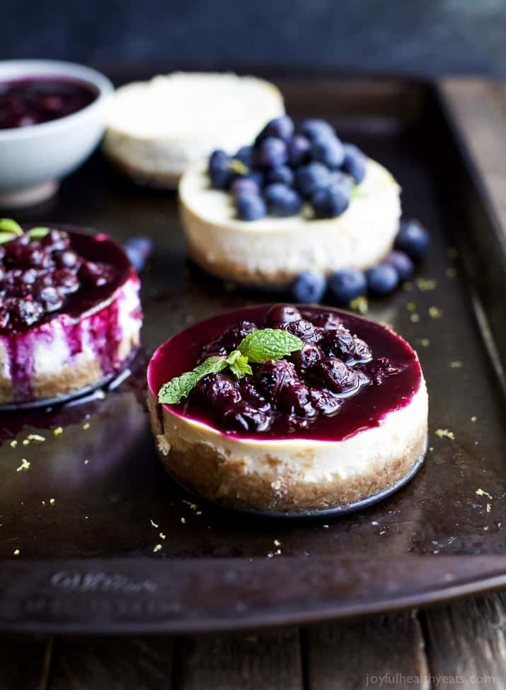 Mini Goat Cheese Cheesecakes topped with blueberries