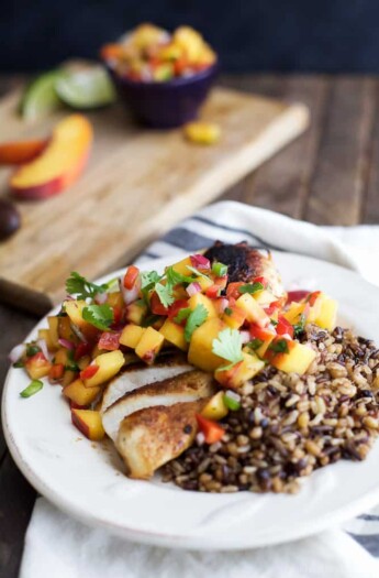 Pan Seared Chicken Breast with fresh Peach Salsa, a flavorful chicken dinner that's done in 30 minutes. It's the perfect meal for a school night! | joyfulhealthyeats.com #paleo #glutenfree