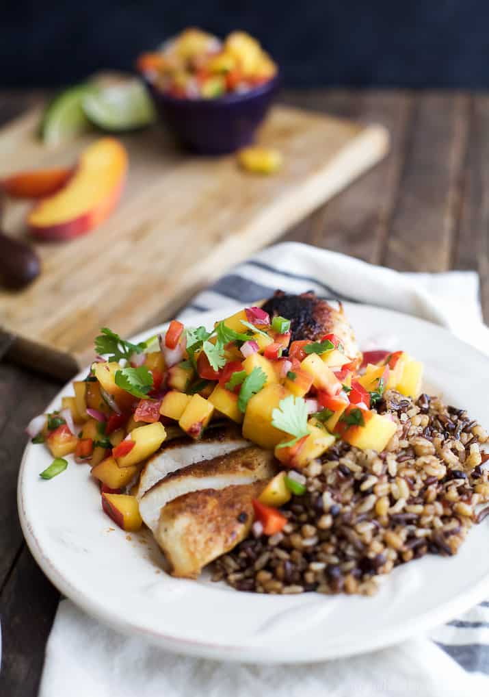 Pan Seared Chicken Breast with fresh Peach Salsa, a flavorful chicken dinner that's done in 30 minutes. It's the perfect meal for a school night! | joyfulhealthyeats.com #paleo #glutenfree