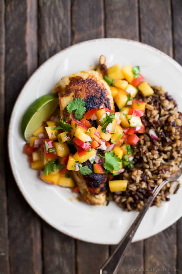 Pan Seared Chicken Breast with fresh Peach Salsa, a flavorful chicken dinner that's done in 30 minutes. It's the perfect meal for a school night! | joyfulhealthyeats.com #paleo #glutenfree
