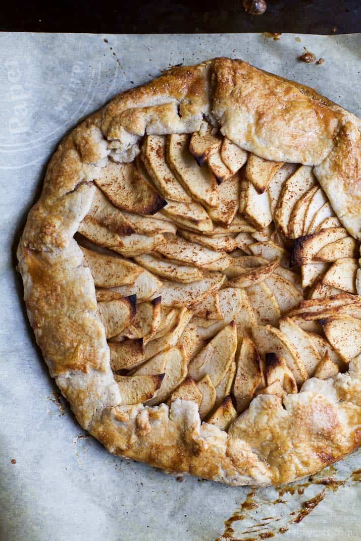 This Rustic Cardamom Apple Galette topped with a Maple Mascarpone is the thing pie dreams are made of. It's easy to make, mind blowing in flavor, and Gluten Free .. you'll fall in love! | joyfulhealthyeats.com