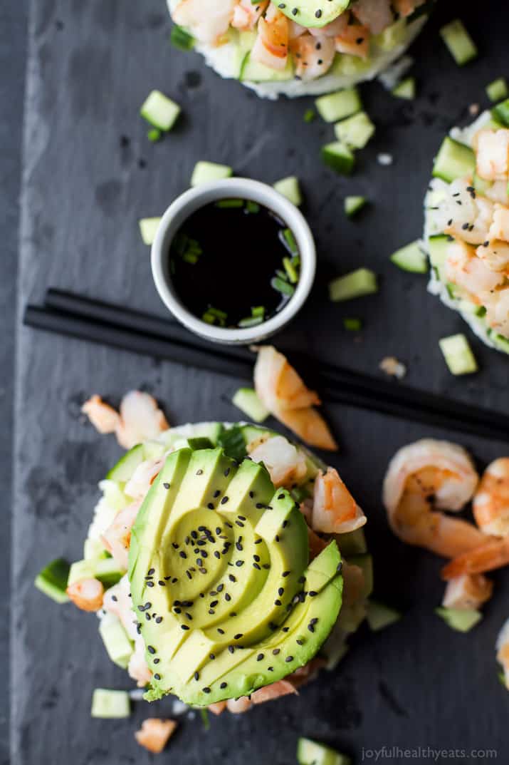 In the mood for Sushi but don't have the time? Problem solved with this easy healthy Stacked California Sushi Roll filled with shrimp, fresh cucumbers, and avocado. Sushi night just got better! | joyfulhealthyeats.com #glutenfree