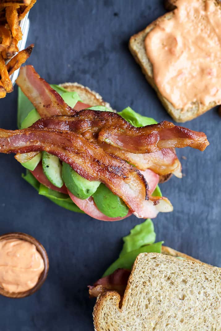 The Ultimate Avocado BLT slathered with a Harissa Mayo that takes this sandwich over the top... that and it's BACON and AVOCADO people! | joyfulhealthyeats.com