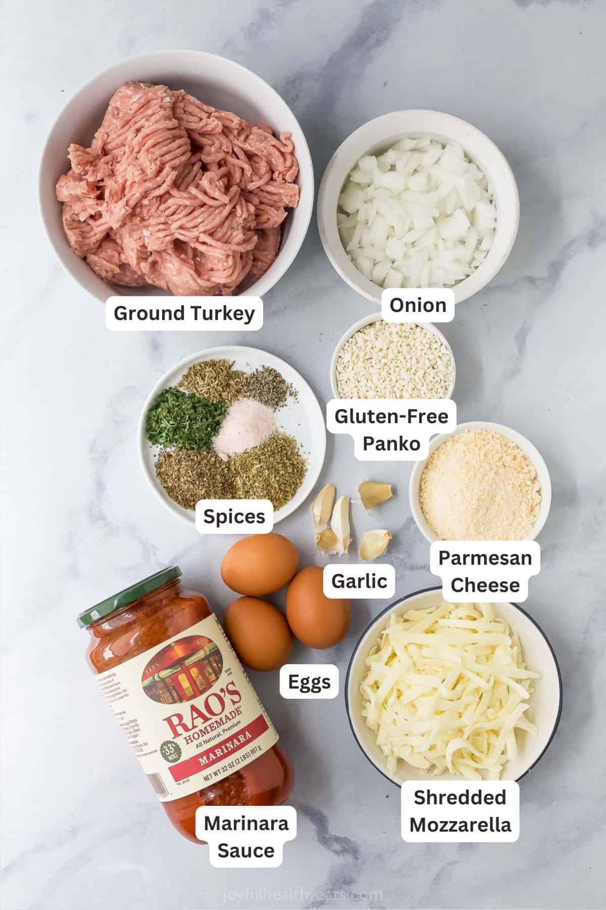 These Baked Turkey Meatballs are cooked in marinara to keep them flavorful and moist, and they’re also loaded with cheese. Done in 30 minutes! Overhead view of ingredients for baked turkey meatballs with mozzarella and marinara