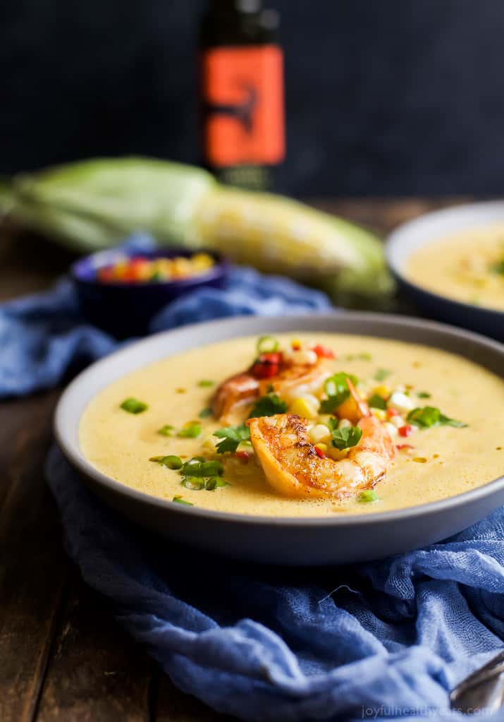 A bowl of Blender Corn Chowder with Pan Seared Shrimp and Corn Relish